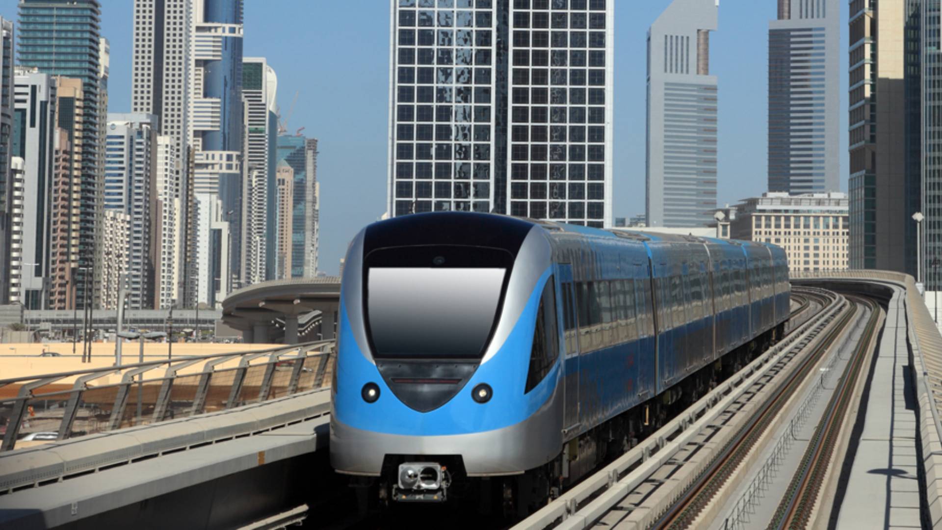 Modern blue metro train traveling